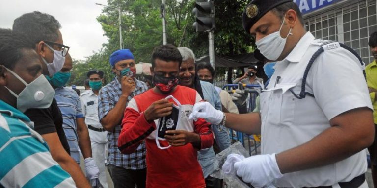 Awareness and distribution of face masks by Kolkata police