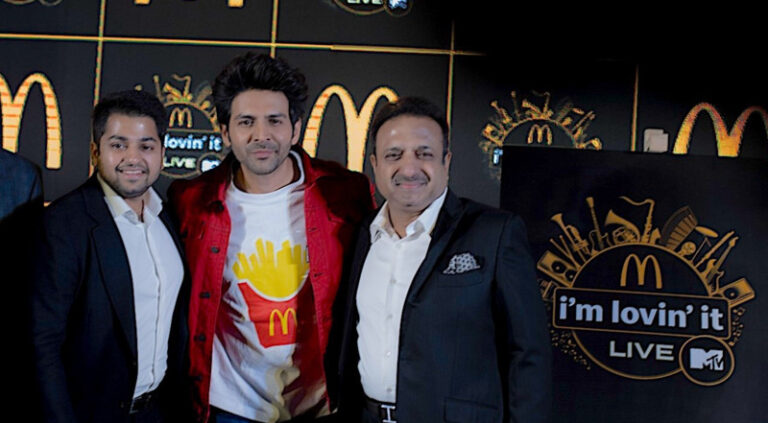 Superstar and Brand Ambassador McDonald's Kartik Aaryan with Sanjeev Agrawal, Chairman, McDonald's India - North and East at the unveil of i'm lovin' it Live