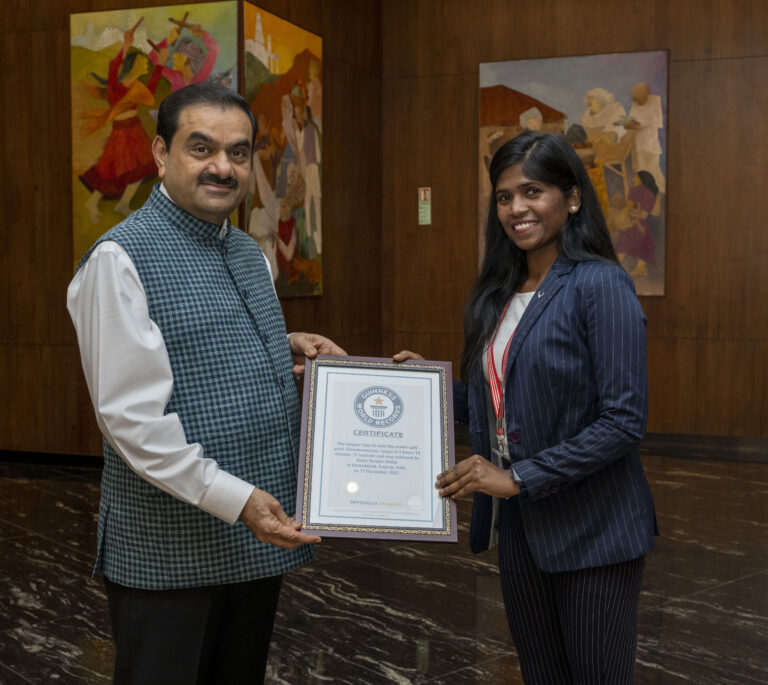 Gautam Adani, Chairman, Adani Group presenting certificate to Smita Kumari