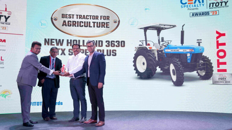 New Holland Agriculture Team receiving Best Tractor for Agriculture Award
