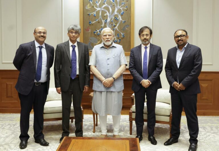 PM Modi along with Network18's Editor-in-Chief Rahul Joshi (right to PM), Santosh Menon, Chief Content Officer, Network18 (second right to PM), Karthik Subbaraman, Managing Editor-Network18 (left to PM), Moneycontrol’s Chief Content & Strategy Officer Javed Sayed (second left to PM)
