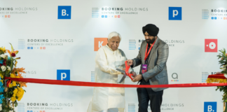 RIBBON CUTTING (Left to Right) Honorable Tourism Minister H.K. Patil and Randhir Bindra, Center of Excellence Lead and General Manager, Booking Holdings India at the official opening of Booking Holdings’ latest Center of Excellence in Bengaluru. The Center will serve as a hub for specialized and highly skilled technology talent supporting the company’s growth and vision for the future of travel.