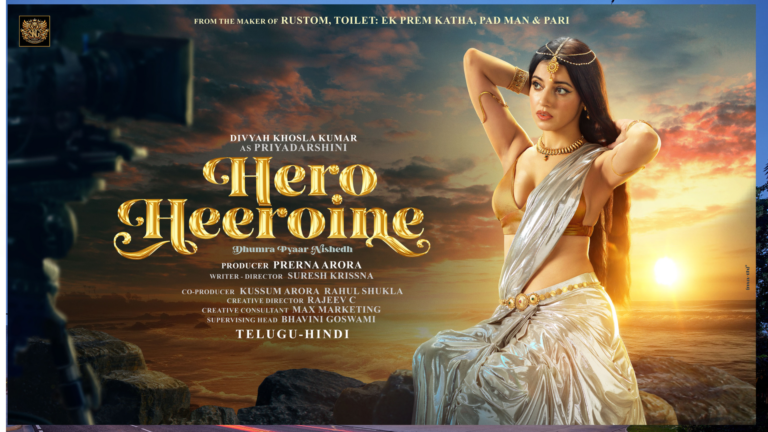 After the massive response from the first look of ‘Hero Heeroine’, makers drop another glimpse & commence the shoot in Hyderabad