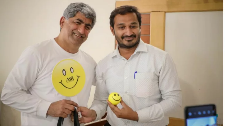 Bengaluru celebrates International Day of Happiness: Happiness Ambassador AiR-Atman in Ravi & Team spread cheer handing out over 10,000 Happiness Goody Bags